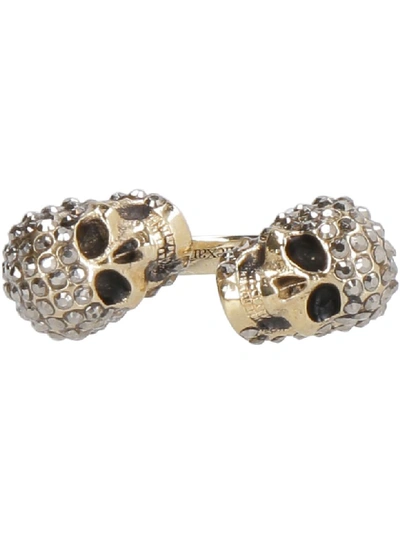Shop Alexander Mcqueen Twin Skull Brass Ring In Gold