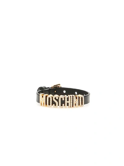 Shop Moschino Crystal Lettering Bracelet In Black (black)