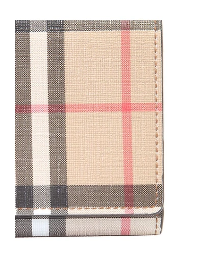 Shop Burberry Checked Wallet In Brown