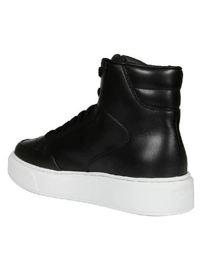 Shop Prada Logo Hi-top Sneakers In Black/white