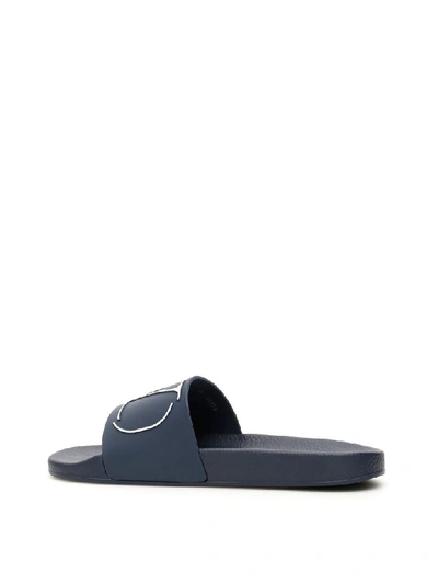 Shop Valentino Vlogo Slides In Marine Bianco (blue)