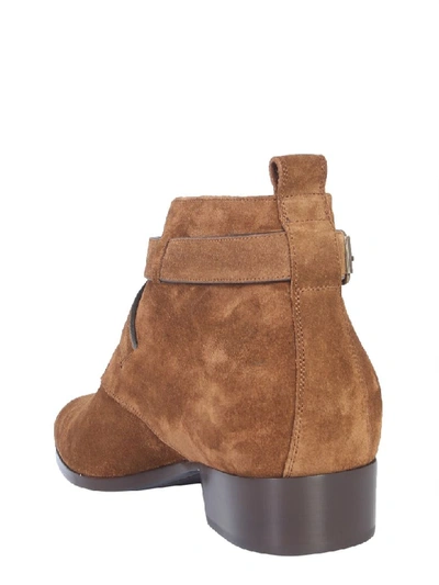 Shop Saint Laurent Wyatt Boots In Marrone