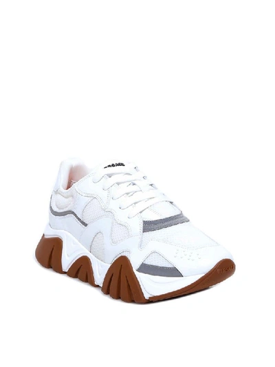 Shop Versace Sneakers In White