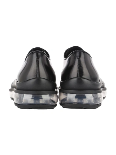 Shop Prada Transparent Sole Derby Shoes In Black