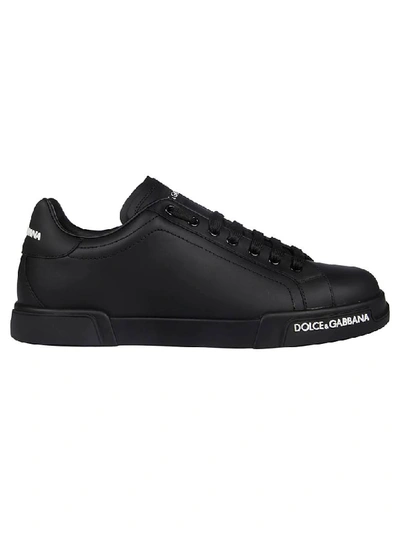 Shop Dolce & Gabbana Logo Embossed Sneakers In Black