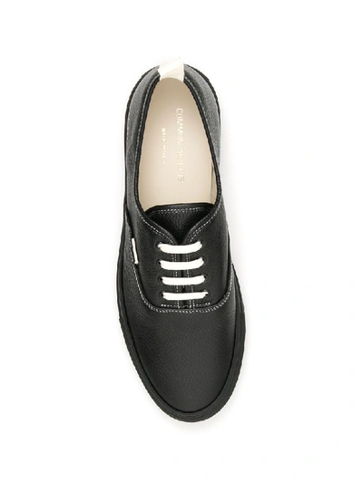 Shop Common Projects Four Hole Sneakers In Black (black)