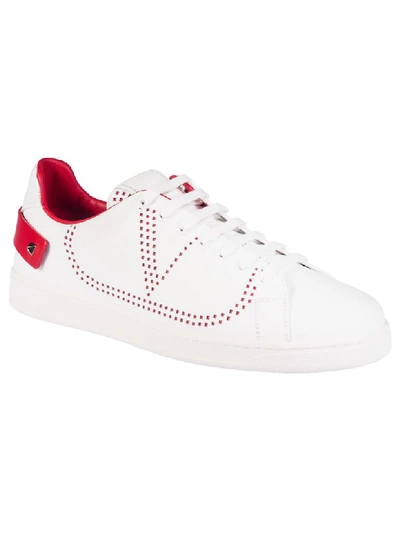 Shop Valentino Perforated Sneakers In White/red