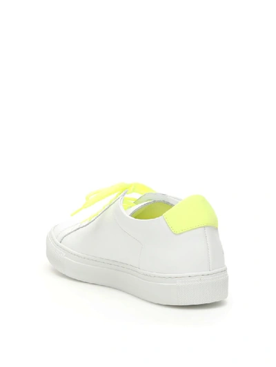 Shop Common Projects Retro Low Fluo Sneakers In White Yellow (white)