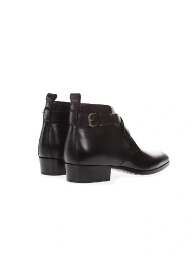 Shop Saint Laurent Black Wyatt Leather Ankle Boots