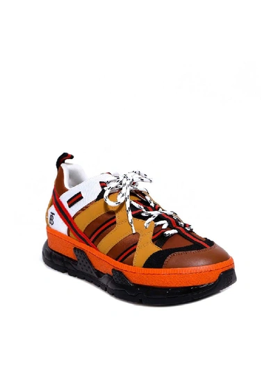 Shop Burberry Sneakers In Orange