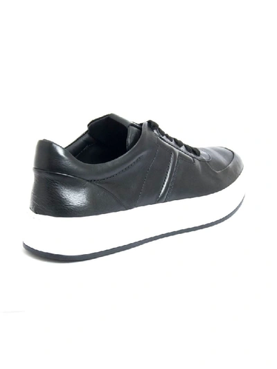 Shop Tod's Sneakers In Black Leather In Nero