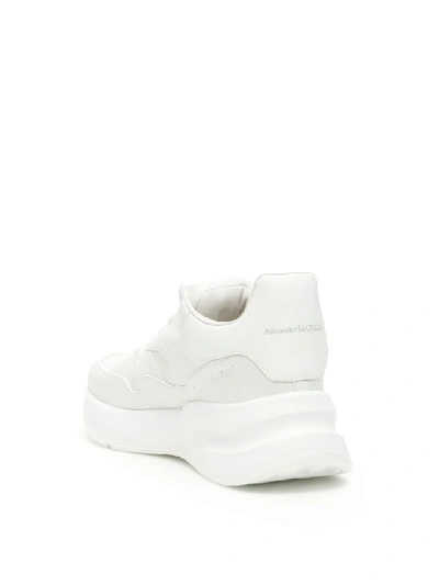 Shop Alexander Mcqueen Oversize Runner Sneakers In Optical White White (white)