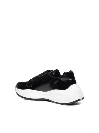 Shop Prada Sneakers In Nero Bianco