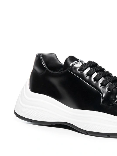 Shop Prada Sneakers In Nero Bianco