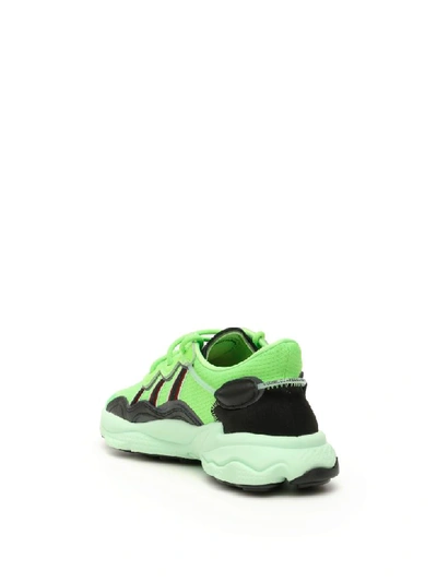 Shop Adidas Originals Ozweego Sneakers In Solar Green (green)