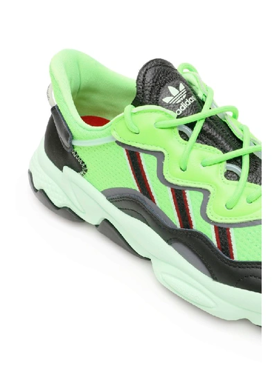 Shop Adidas Originals Ozweego Sneakers In Solar Green (green)