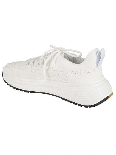 Shop Bottega Veneta Stitched Sneakers In White