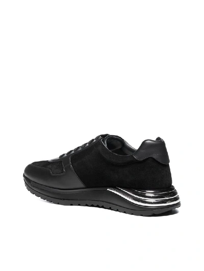 Shop Ferragamo Sneakers In Nero