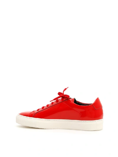 Shop Common Projects Achilles Premium Sneakers In Red Black (red)