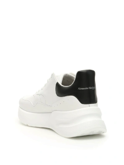 Shop Alexander Mcqueen Oversize Running Sneakers In Optic White Black (white)