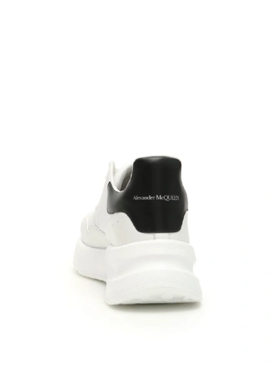 Shop Alexander Mcqueen Oversize Running Sneakers In Optic White Black (white)