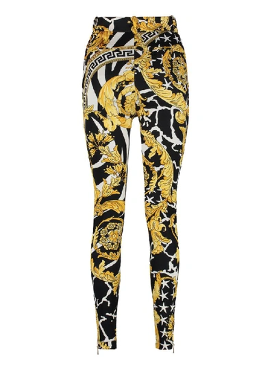 Shop Versace Printed Leggings In Gold