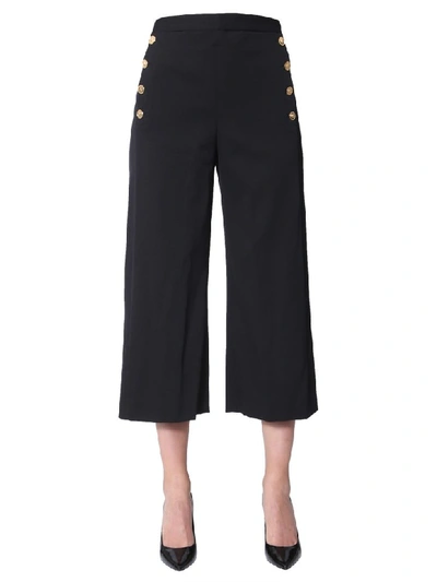 Shop Versace Cropped Trousers In Nero