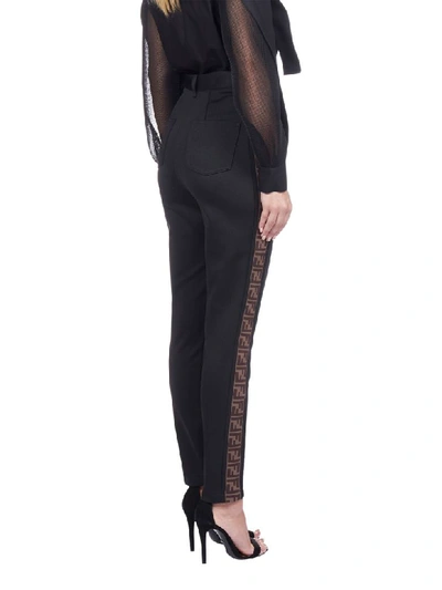Shop Fendi Trousers In Black