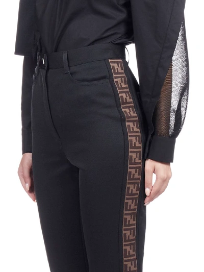 Shop Fendi Trousers In Black