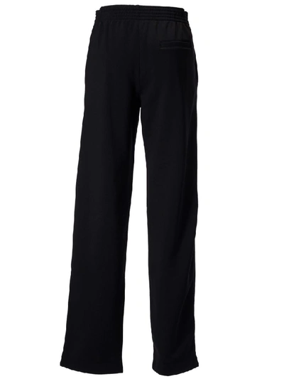 Shop Givenchy Logo Trousers In Black