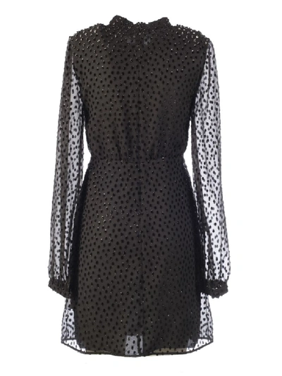 Shop Saint Laurent Long-sleeved Mini Dress In Black