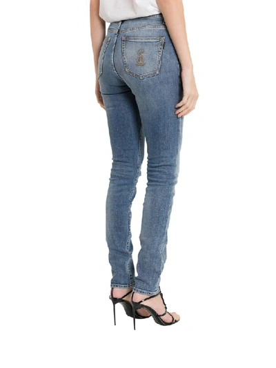 Shop Saint Laurent Sl Embroidered Skinny Jeans In Blu