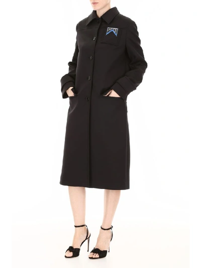 Shop Prada Coat With Logo In Nero (black)