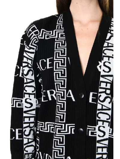 Shop Versace Black Wool Greca Logo Cardigan In Black/white