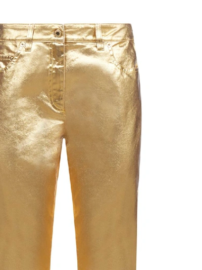 Shop Moschino Pants In Oro