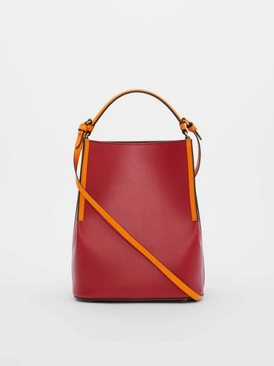 Shop Burberry Small Two-tone Leather Peggy Bucket Bag In Crimson