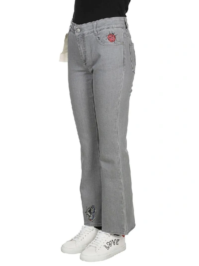 Shop Stella Mccartney Embroidered Flared Denim Jeans In Grey