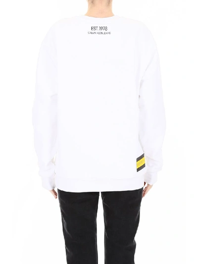 Shop Calvin Klein Logo Sweatshirt In White Black Yellow Flag (white)