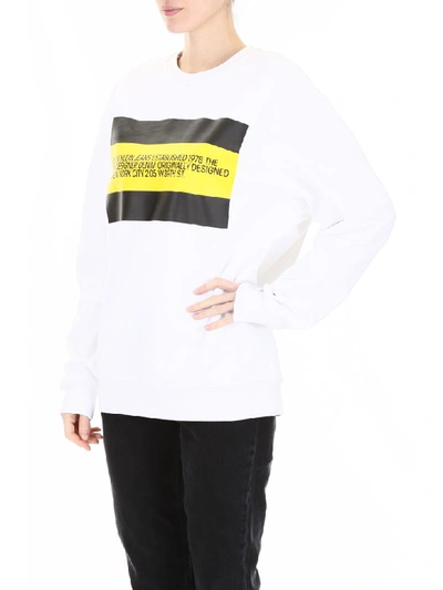 Shop Calvin Klein Logo Sweatshirt In White Black Yellow Flag (white)