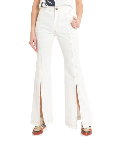 Shop Chloé Flared Jeans With Slits In Bianco