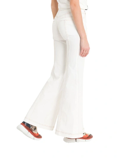 Shop Chloé Flared Jeans With Slits In Bianco