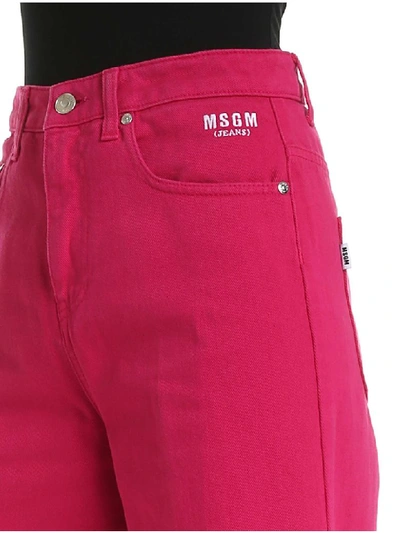 Shop Msgm Jeans Bull Palazzo Cropped In Fuxia