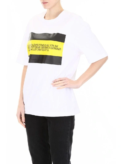 Shop Calvin Klein Logo T-shirt In White Black Yellow Flag (white)