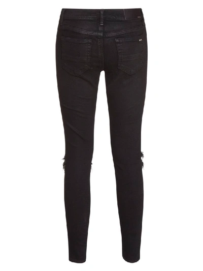 Shop Amiri Distressed Skinny Jeans In Nero