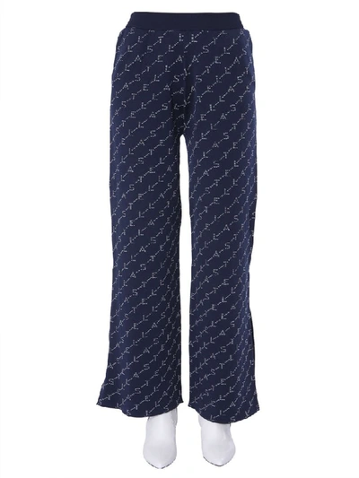 Shop Stella Mccartney Monogram Trousers In Blu