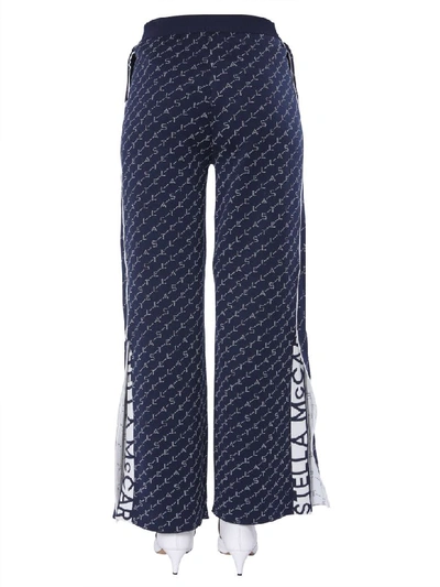 Shop Stella Mccartney Monogram Trousers In Blu