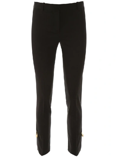 Shop Versace Safety Pin Trousers In Nero (black)