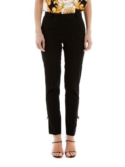 Shop Versace Safety Pin Trousers In Nero (black)