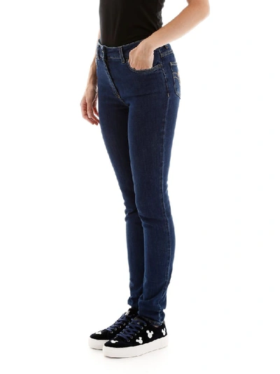 Shop Moschino Teddy Bear Jeans In Denim (blue)