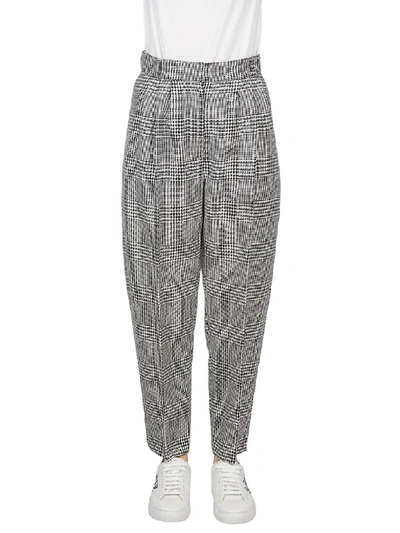 Shop Alexander Mcqueen Heritage Check Trousers In Black White